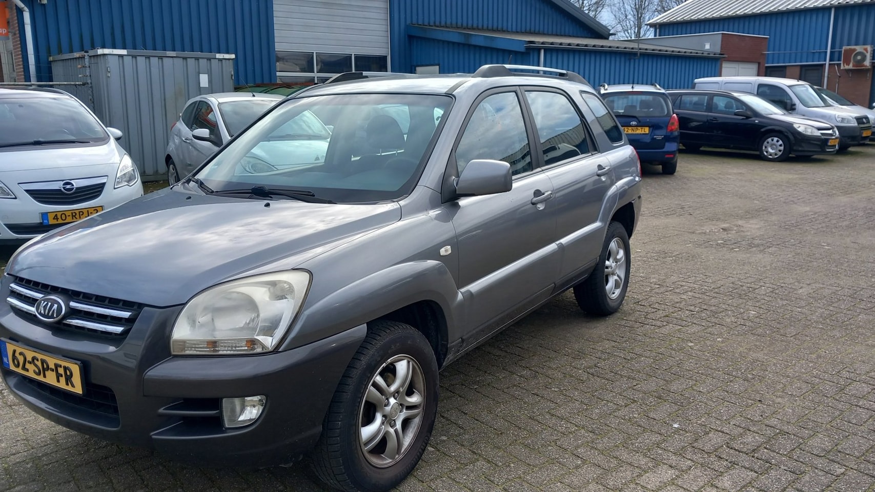Kia Sportage - 2.0 CVVT Comfort 2.0 CVVT Comfort - AutoWereld.nl
