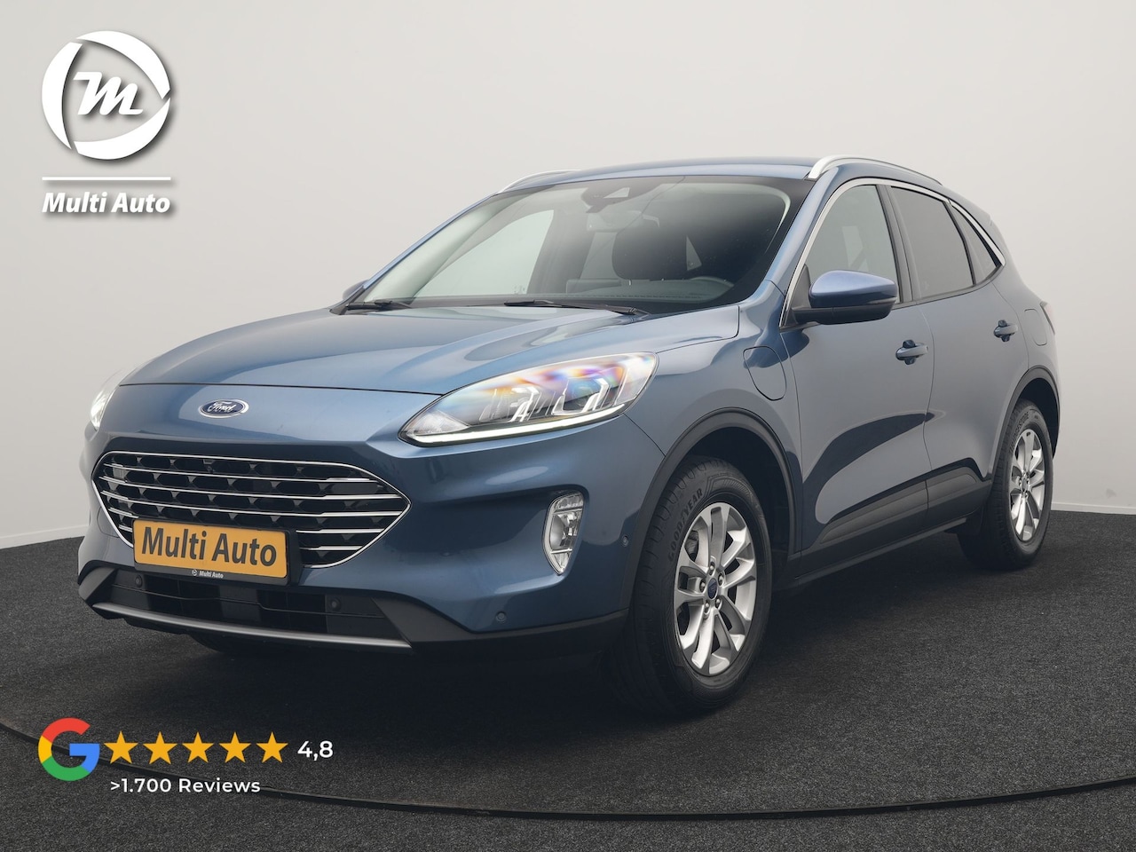 Ford Kuga - 2.5 PHEV Titanium 225pk Dealer O.H | Adaptive Cruise | 360 Camera | BLIS | Stoelen & Stuur - AutoWereld.nl