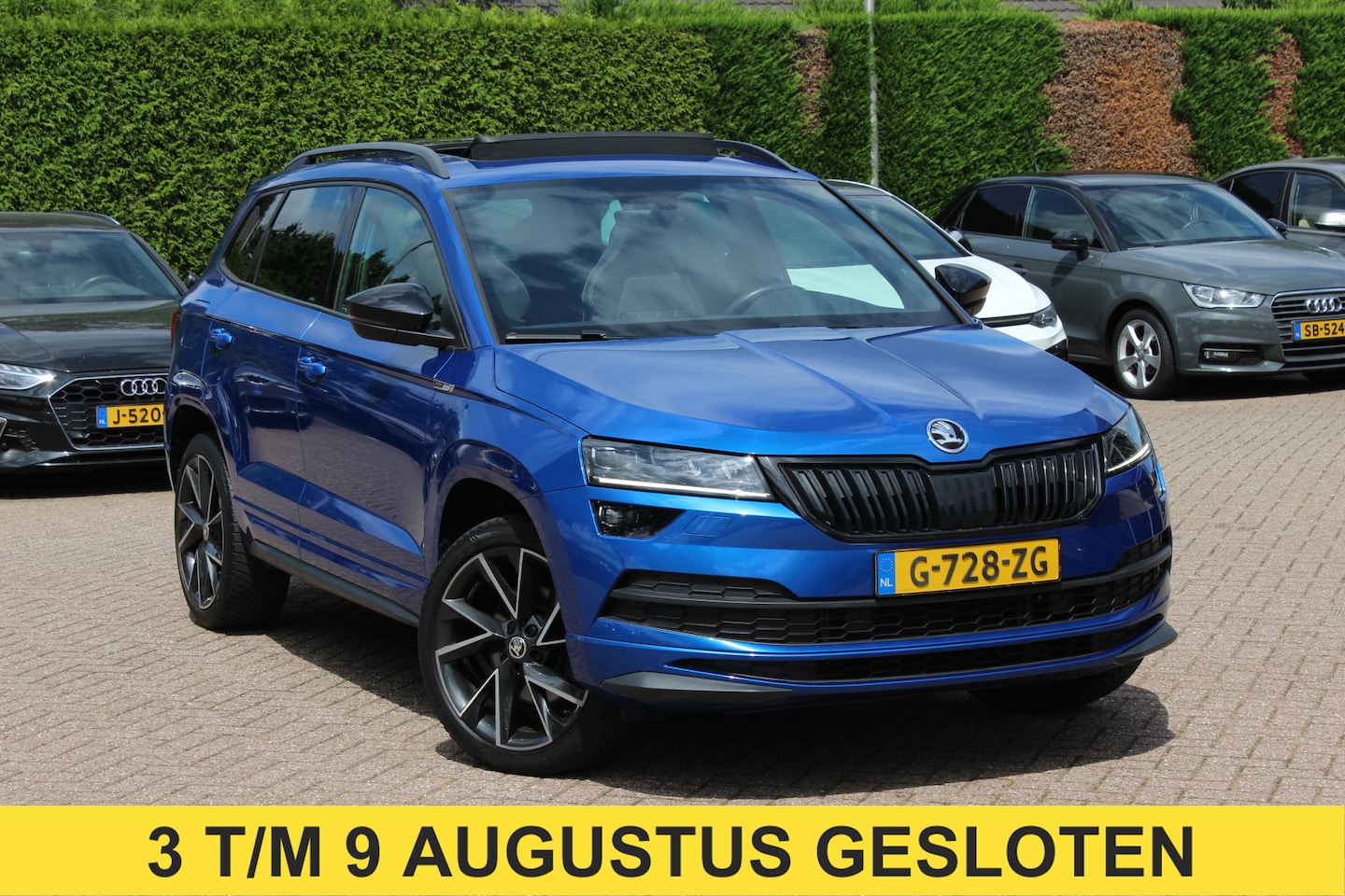 Skoda Karoq - 2.0 TSI 4x4 Sportline Business / NL Auto! / Trekhaak / Panoramadak / Camera / CarPlay / Ke - AutoWereld.nl