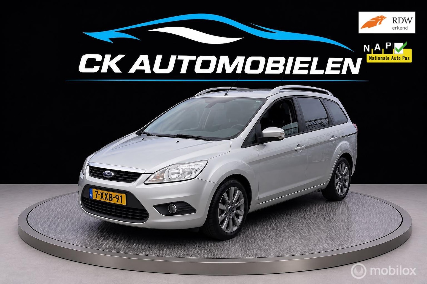 Ford Focus Wagon - 1.8 Titanium clima half lederebekeding - AutoWereld.nl