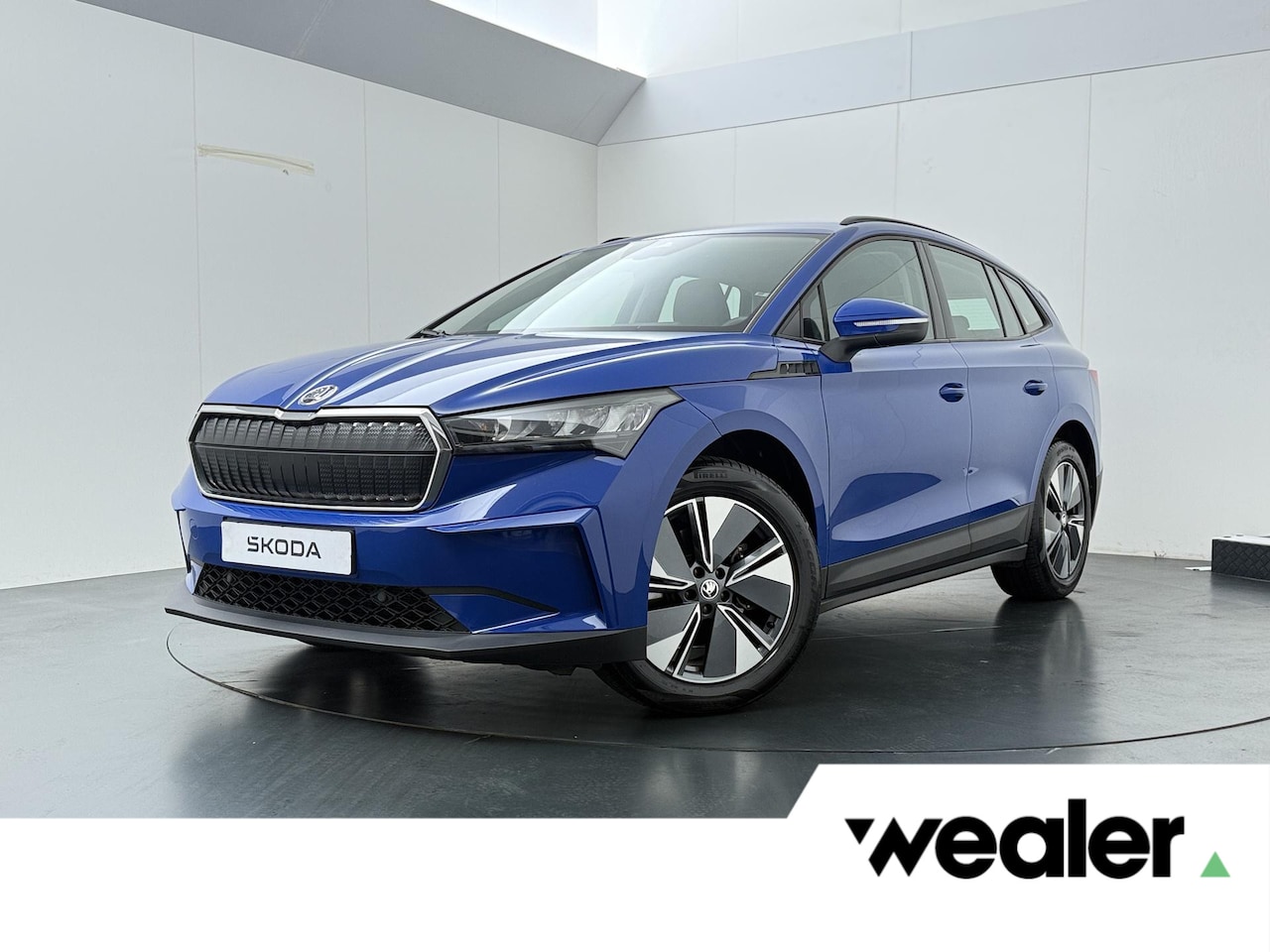 Skoda Enyaq iV - 60 | 180 PK | Warmtepomp | Adaptive Cruise Control | Navigatiesysteem | Stoelverwarming | - AutoWereld.nl