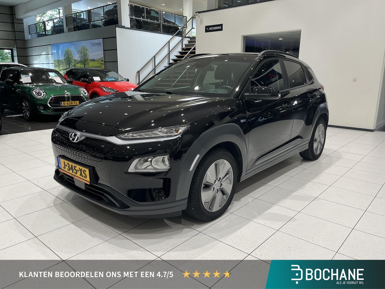 Hyundai Kona Electric - EV Fashion 64 kWh | SOH 91,6% | Navi | Adaptieve cruise control, Camera | Dodehoek bewakin - AutoWereld.nl
