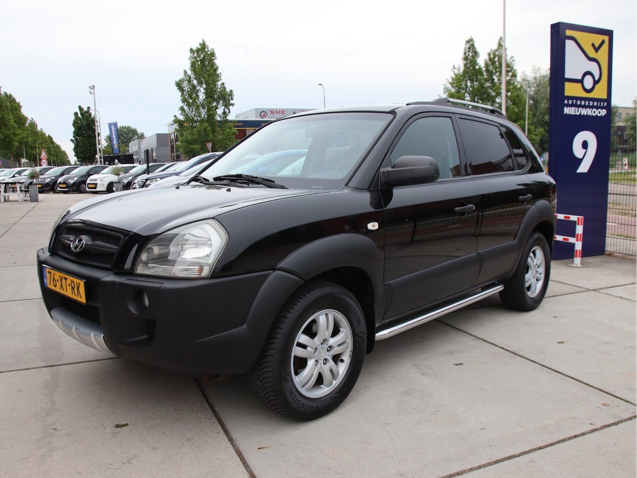 Hyundai Tucson - 2.0i Dynamic Cross Airco, Carkit, El. Ramen, Cruise Zomeractie! - AutoWereld.nl