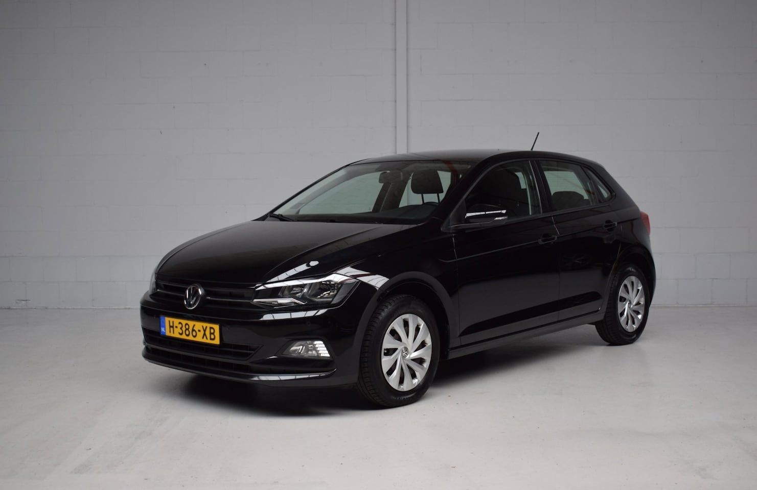 Volkswagen Polo - 1.0 TSI 95PK Comfortline 5-DRS ORG.NED / NAP / CARPLAY / NAVIGATIE / DAB+ - AutoWereld.nl