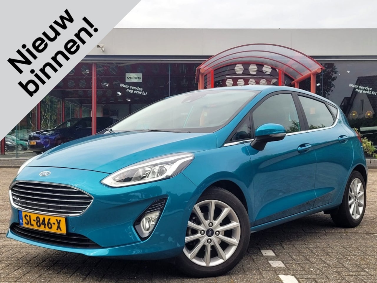 Ford Fiesta - 1.0 EcoB. Titanium | Parkeersensoren | Trekhaak - AutoWereld.nl