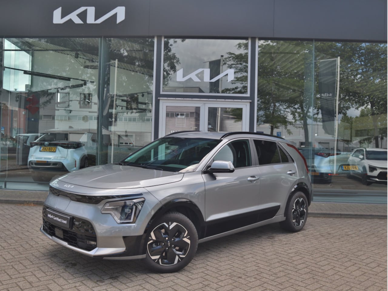 Kia Niro EV - DynamicPlusLine 64.8 kWh | Navigatie | Stoel/Stuurverwarming | Leder | Tot 10Jr. Kia Garan - AutoWereld.nl