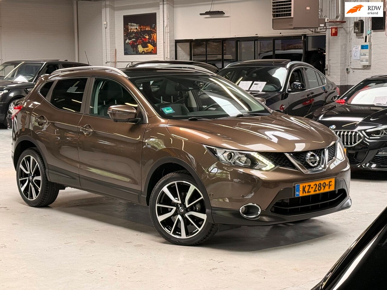 Nissan Qashqai - 1.2 Tekna Panorama Leder Navigatie Cruise control Org. NL - AutoWereld.nl