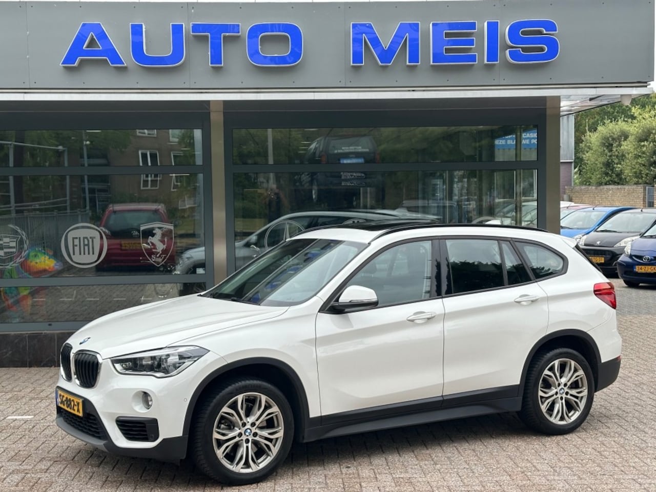 BMW X1 - S Drive20i High Executive Automaat Navi Leer Camera Panorama Trekhaak NAP-Autopas - AutoWereld.nl