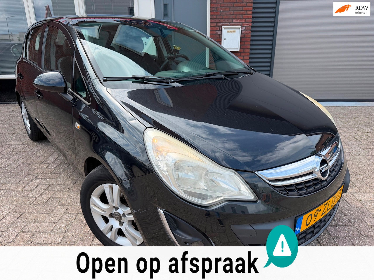 Opel Corsa - 1.4-16V Anniversary Edition / Leder / PDC / Airco / Cruise - AutoWereld.nl