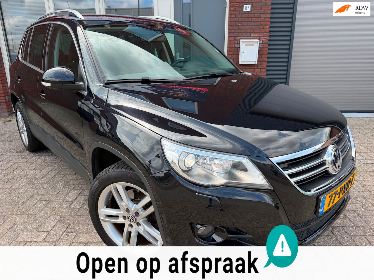 Volkswagen Tiguan - 1.4 TSI Sport&Style / Navi / Clima / Cruise / LM / NAP - AutoWereld.nl