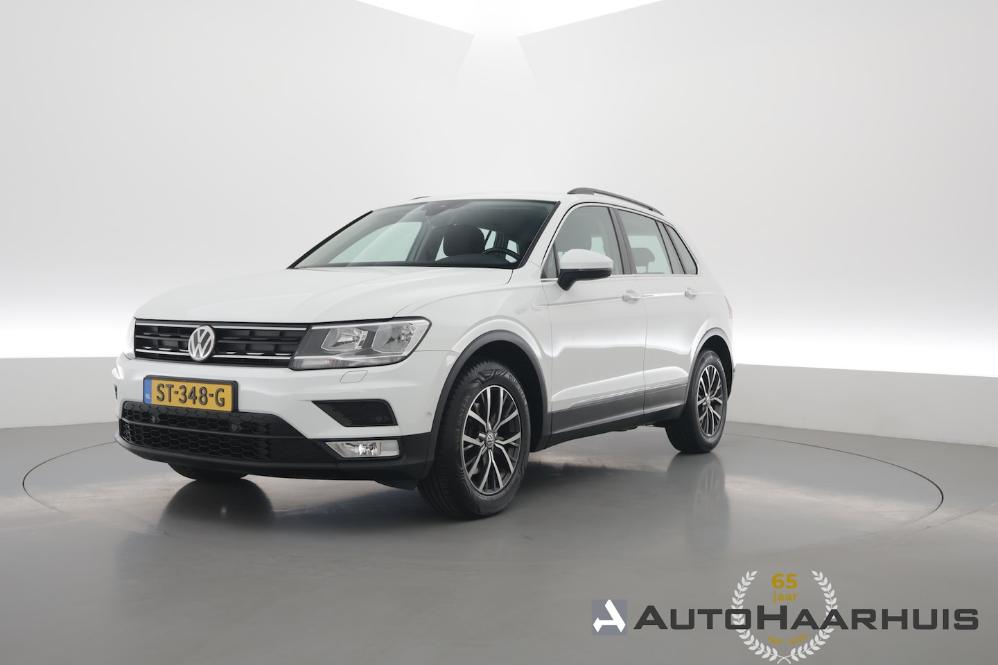 Volkswagen Tiguan - 1.4 TSI Comfortline | Cruise Contr. | Trekhaak | All Season | Camera | Navi | Stoelverw. | - AutoWereld.nl