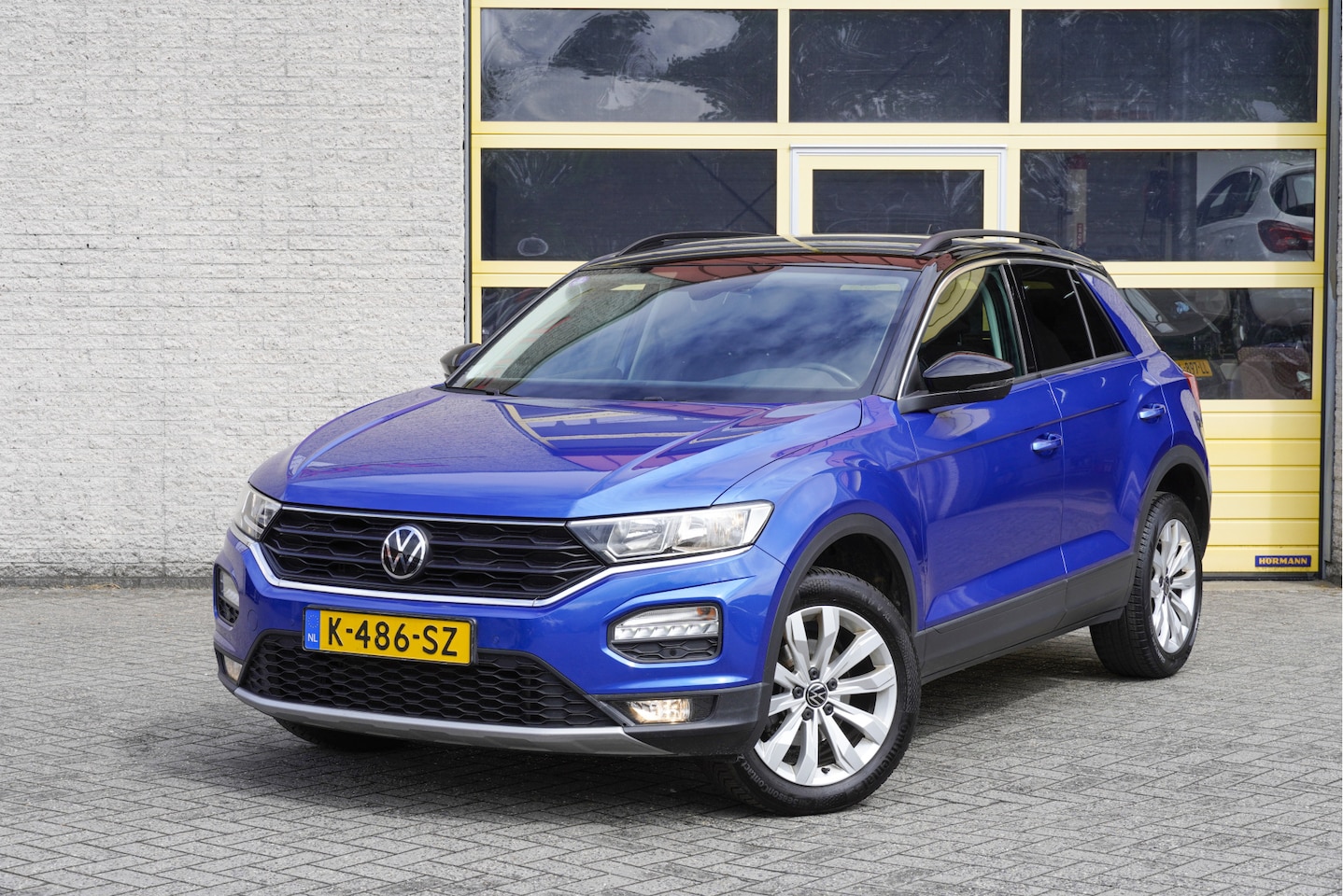 Volkswagen T-Roc - 1.0 TSI Style BJ2021 Lmv 17" | Led | Pdc | Navi | Airco | Climate control | Cruise control - AutoWereld.nl