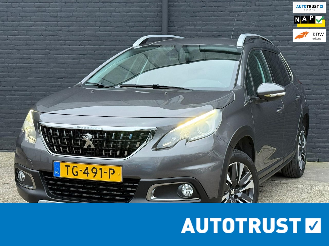 Peugeot 2008 - 1.2 PureTech Allure NAVI|CAMERA|PDC|CRUISE|TREKHAAK| CLIMA - AutoWereld.nl
