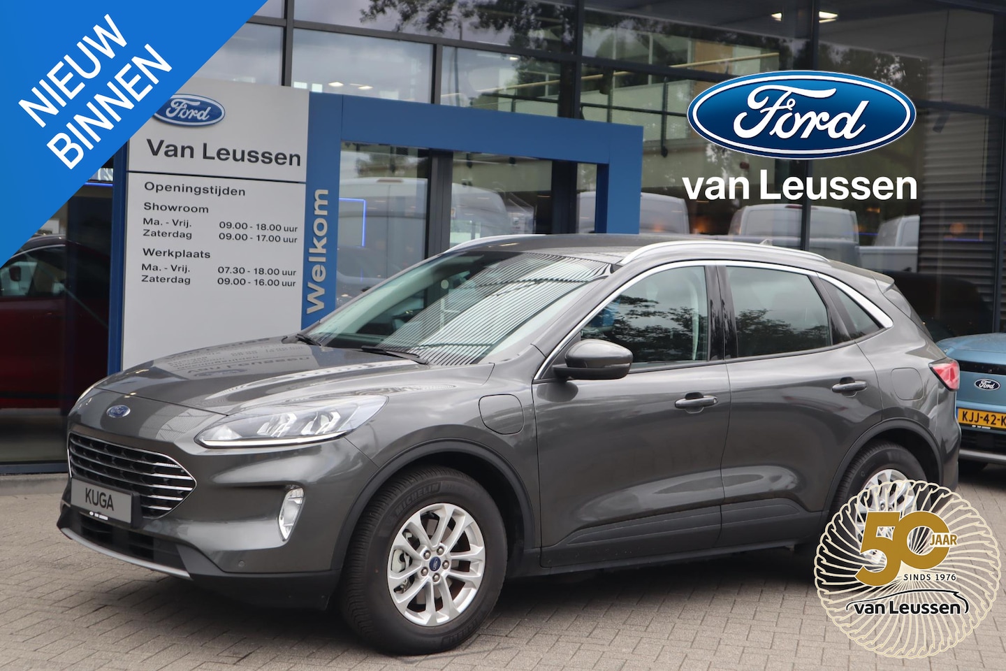 Ford Kuga - 2.5 PHEV TITANIUM KEYLESS CLIMA WINTERPACK PARK-SENSOREN CAMERA LED ALL-SEASON - AutoWereld.nl
