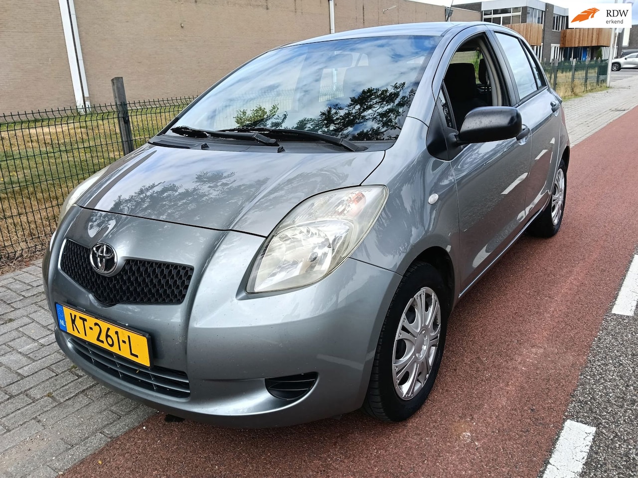 Toyota Yaris - 1.3 VVTi Cool 1.3 VVTi Cool - AutoWereld.nl