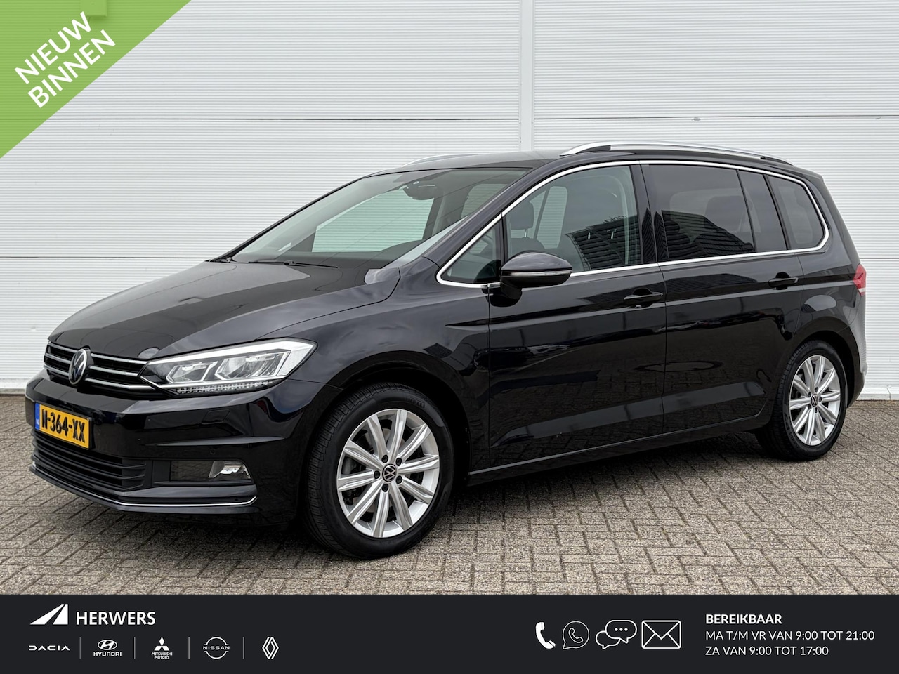 Volkswagen Touran - 1.5 TSI Highline 7p / Navigatiesysteem full map / Voorstoelen verwarmd / 7 personen / Crui - AutoWereld.nl
