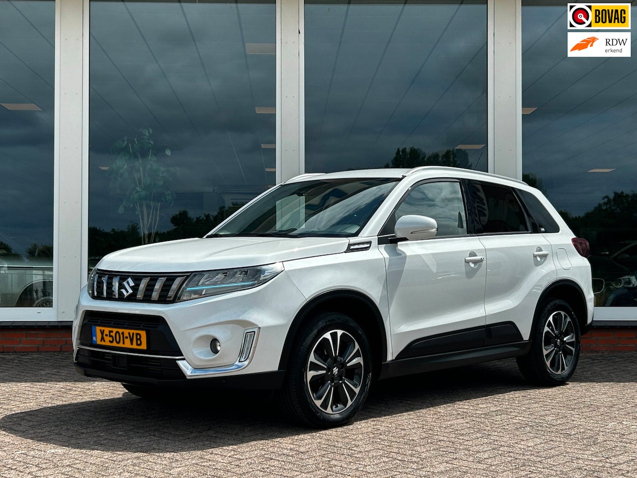 Suzuki Vitara - 1.4 Boosterjet Style Smart Hybrid - Navi - Leder - PDC - Camera - AutoWereld.nl