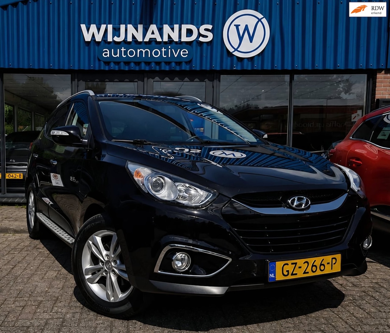 Hyundai ix35 - 1.6i GDI Pro Trekhaak Stoelvw Clima Cruise Scherm - AutoWereld.nl