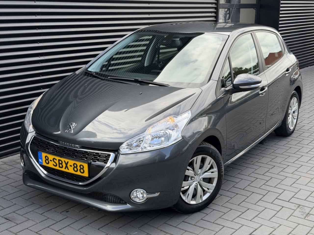 Peugeot 208 - 1.2 VTi Envy 2013| 97DKM NAP| CLIMA| CRUISE| NAVI| RIEM VV - AutoWereld.nl