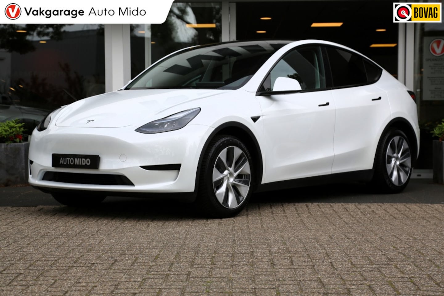 Tesla Model Y - RWD 58 kWh | 1e eigenaar | All-season banden - AutoWereld.nl