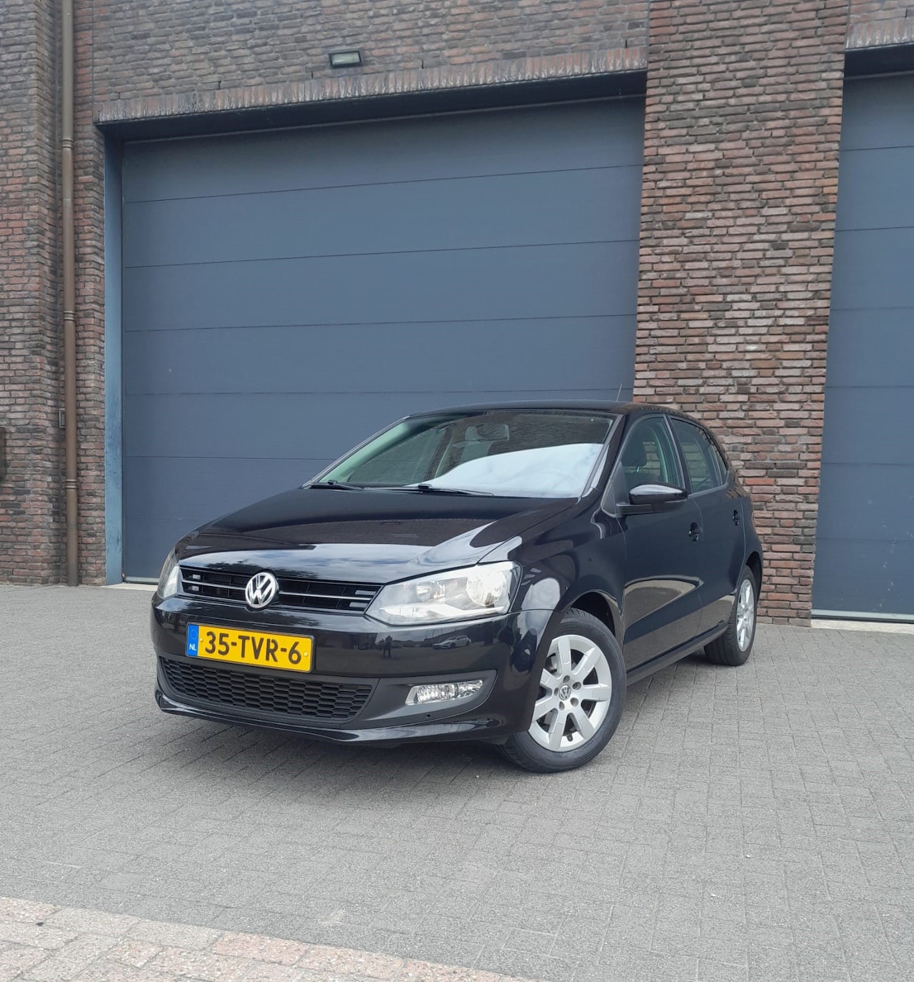 Volkswagen Polo - 1.2 TSI Comfortline Automaat 5 Dr Airco Navi - AutoWereld.nl