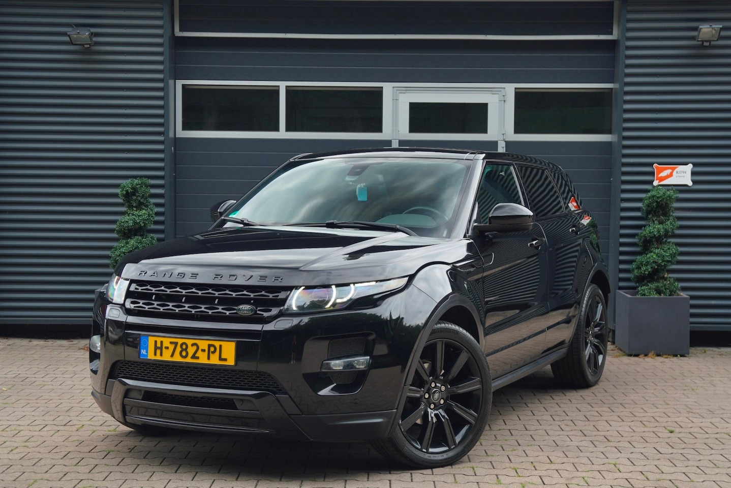 Land Rover Range Rover Evoque - 2.2 SD4 4WD Prestige PANO MERIDIAN CAMERA MEMORY SMOKED - AutoWereld.nl