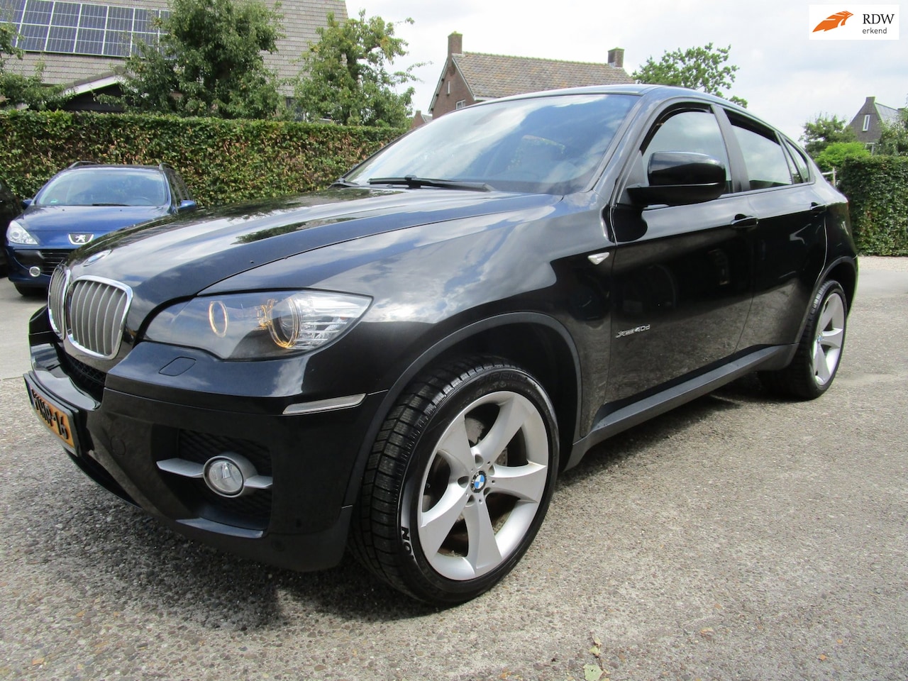 BMW X6 - XDrive40d High Executive leer 20inc breed set, nieuw - AutoWereld.nl