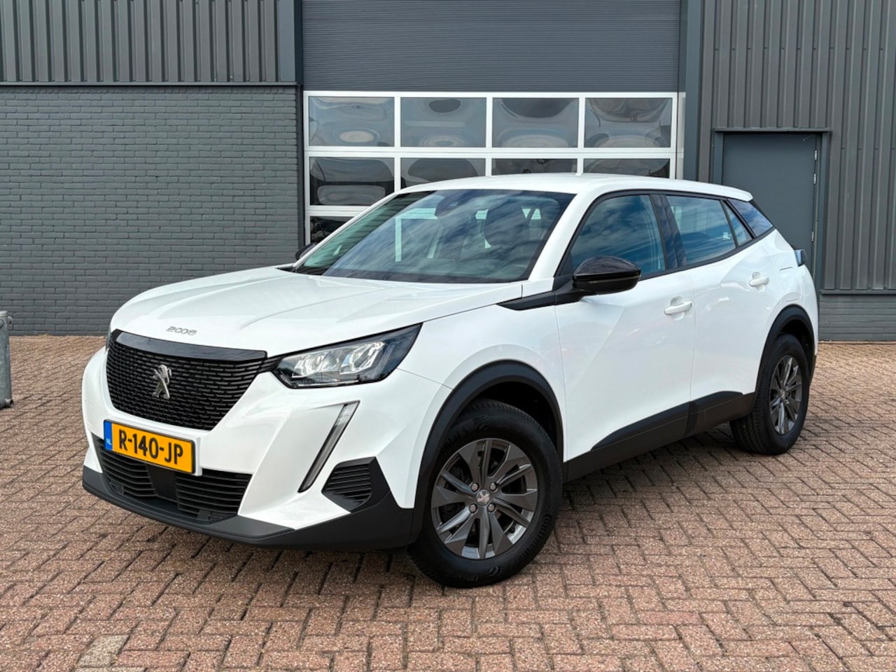 Peugeot 2008 - 1.2 PureTech Active Pack Climate control PDC Camera - AutoWereld.nl