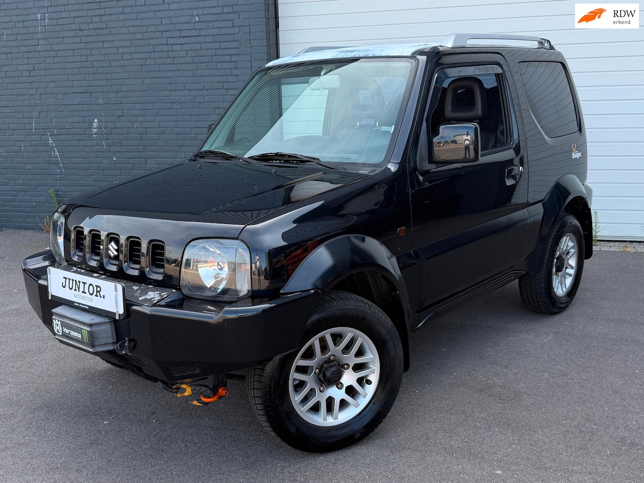 Suzuki Jimny - 1.3 JX 4X4 LIER/OFFROADBANDEN/STOELVERWARMING/AIRCO - AutoWereld.nl