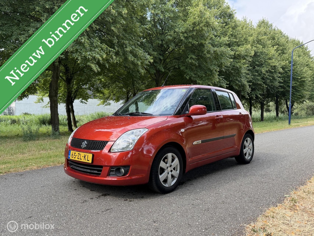 Suzuki Swift - 1.5 Exclusive*AUTOMAAT*NEW APK 07/26*AIRCO - AutoWereld.nl