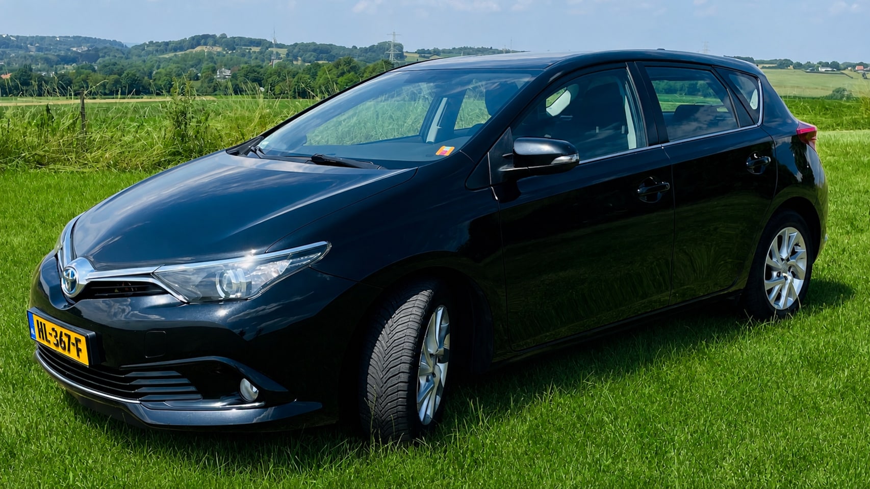 Toyota Auris - 1.8 Hybrid Aspiration - AutoWereld.nl