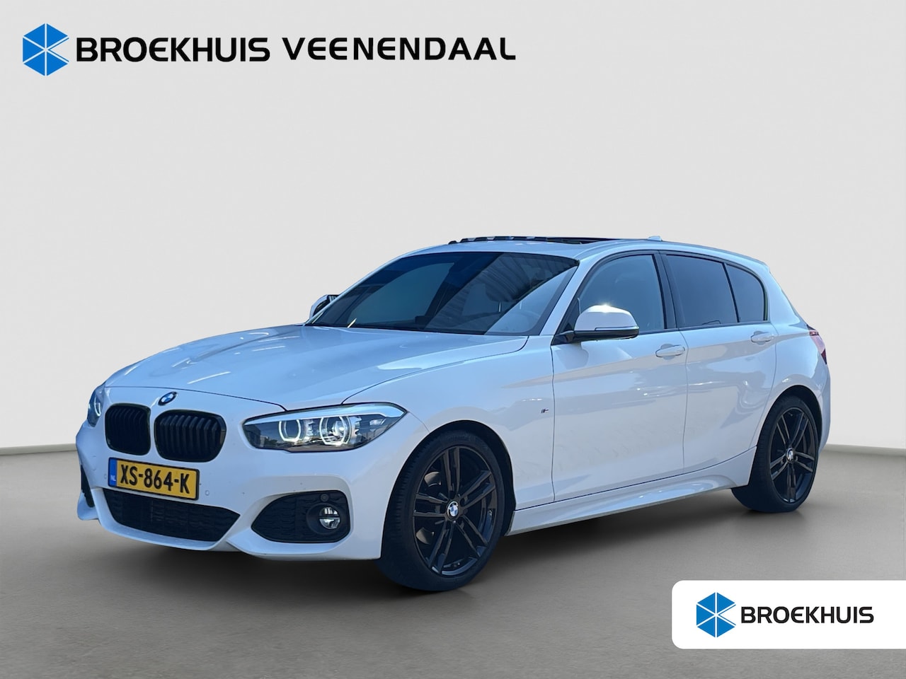 BMW 1-serie - 118i High Executive M-Sport | Pano | Cruise Control | Stoelverwarming | Navi | Bluetooth | - AutoWereld.nl