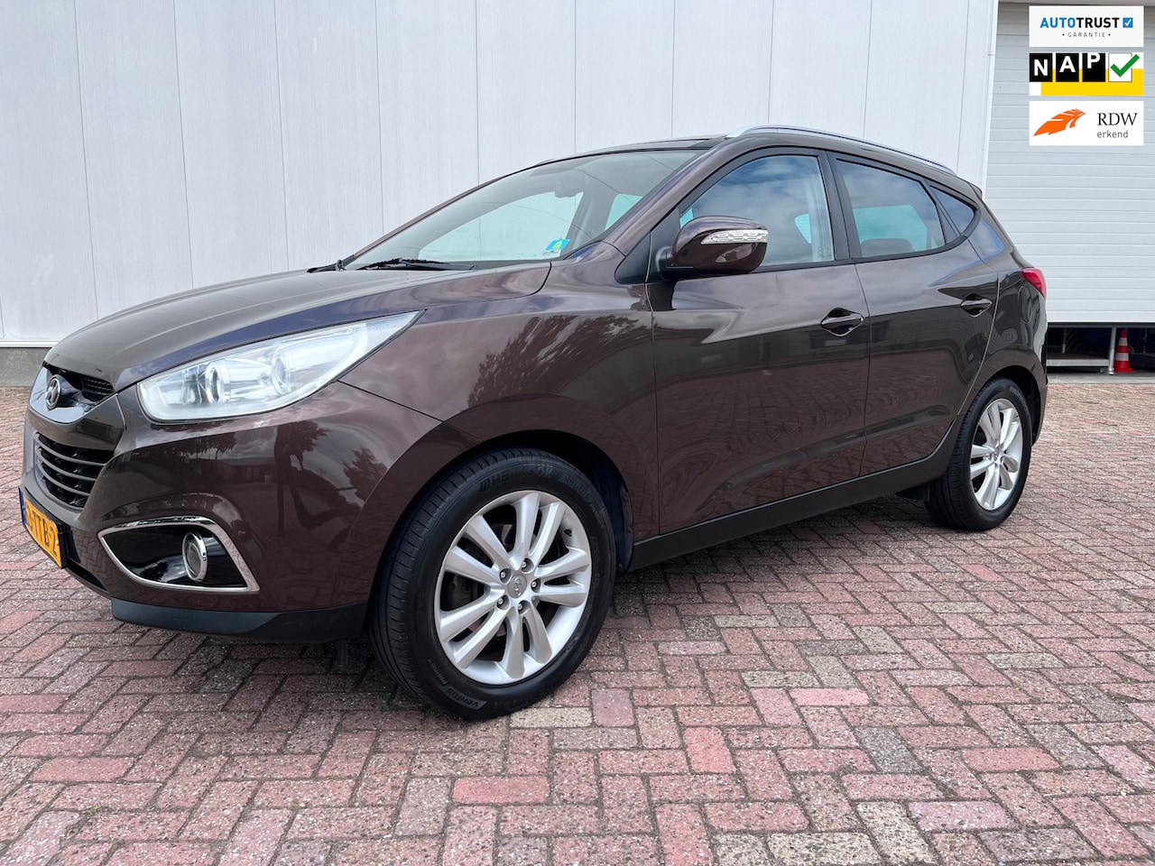 Hyundai ix35 - 2.0i i-Catcher automaat Panorama dak camera navigatie winterpakket 2012 - AutoWereld.nl