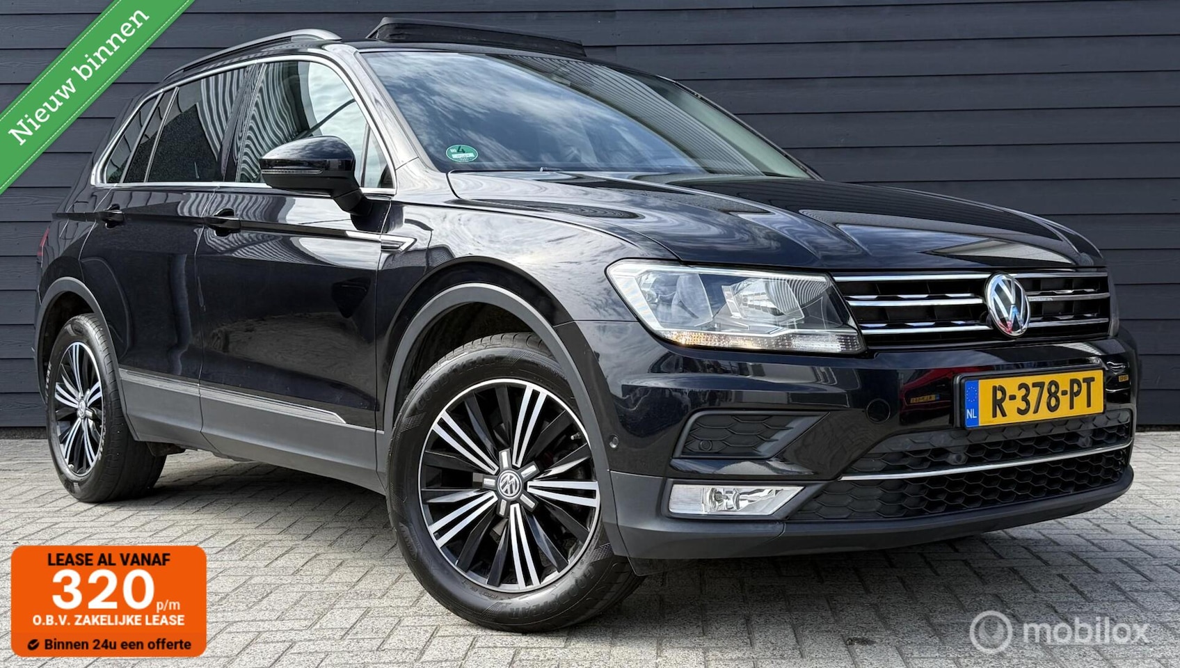 Volkswagen Tiguan - 1.4 TSI ACT Comfortline + Pano.dak/Camera/Winterpakket - AutoWereld.nl