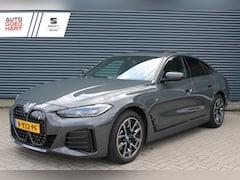 BMW i4 - eDrive40 84 kWh M-Sport SOH-100% Dravitgrau Schuif-/kanteldak Leer Harman-Kardon Camera