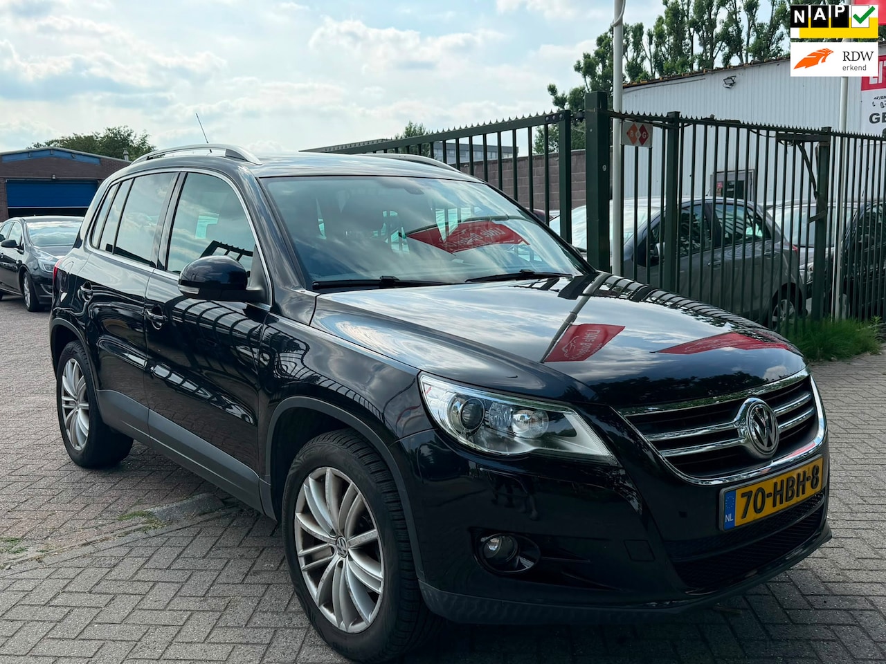 Volkswagen Tiguan - 1.4 TSI Sport&Style 4Motion 2e eigenaar dealer onderhouden Airco elektrische ramen cv op a - AutoWereld.nl
