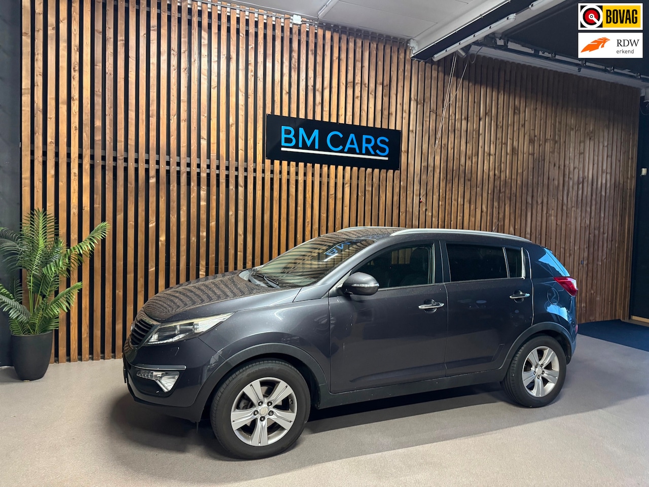 Kia Sportage - 1.6 GDI ISG X-ecutive Plus Pack Camera - AutoWereld.nl