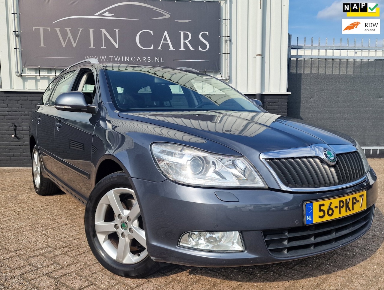 Skoda Octavia Combi - 1.2 TSI Elegance Business Line Aut navi Airco Xenon - AutoWereld.nl