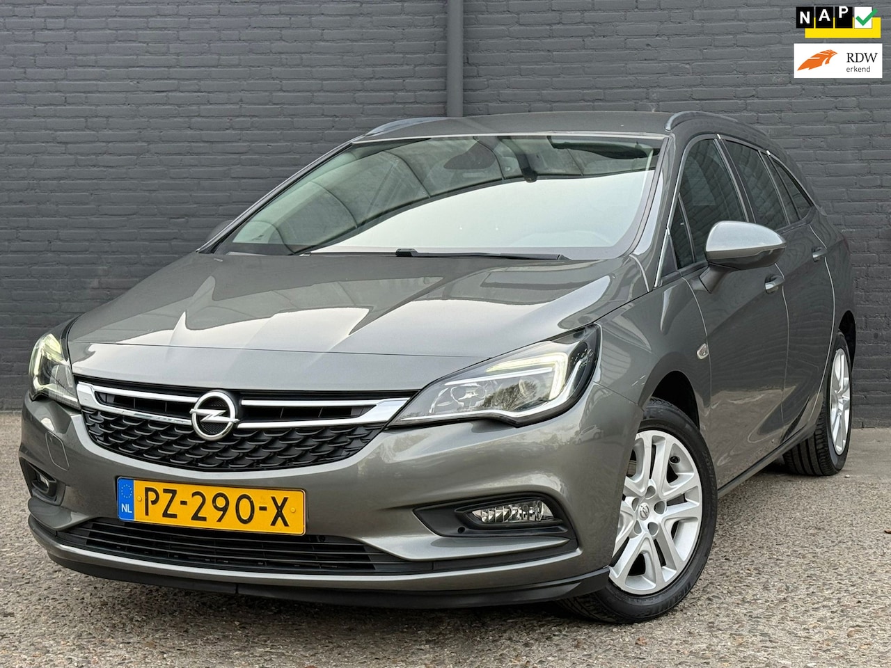 Opel Astra Sports Tourer - 1.0 Business+ CARPLAY|NAVI|PDC|TREKHAAK|AIRCO|NWE APK - AutoWereld.nl