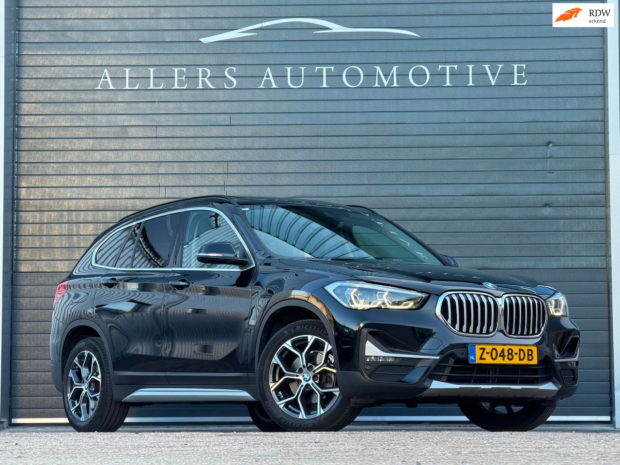 BMW X1 - SDrive18i High Executive|PANO|SFEER|ELEKTRISCHE KLEP - AutoWereld.nl