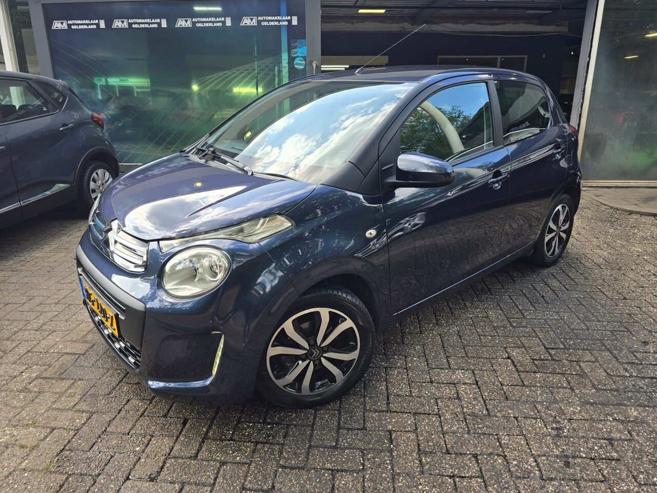 Citroën C1 - 1.0 e-VTi Shine | 1E EIGENAAR |3/6 OF 12MND GARANTIE | AIRCO | ANDROID | LMV | - AutoWereld.nl
