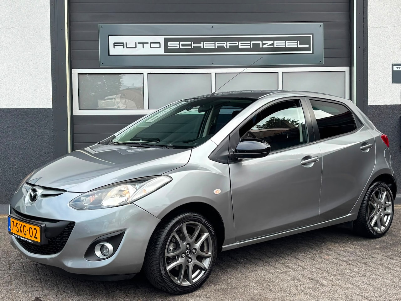 Mazda 2 - 1.3 Hanabi | AIRCO | 71.210 km | ZUINIG | NL AUTO - AutoWereld.nl