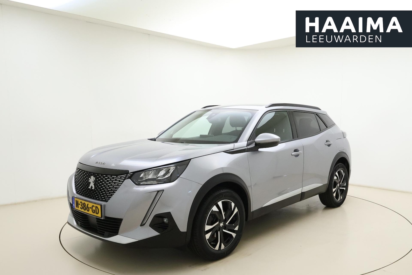 Peugeot 2008 - 1.2 PureTech Blue Lease Allure | Adaptive Cruise Control | Verwarmd voorruit | Keyless Ent - AutoWereld.nl