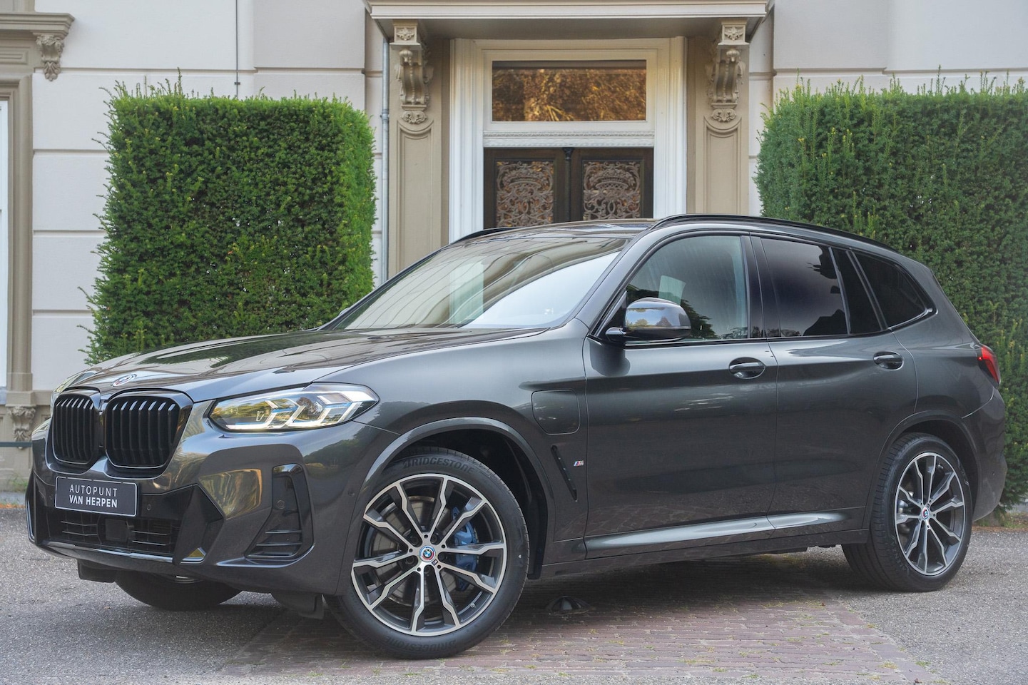BMW X3 - xDrive30e High Executive TREKHAAK | ADAPTIVE | KEYLESS | HUD | LASER | CAMERA - AutoWereld.nl