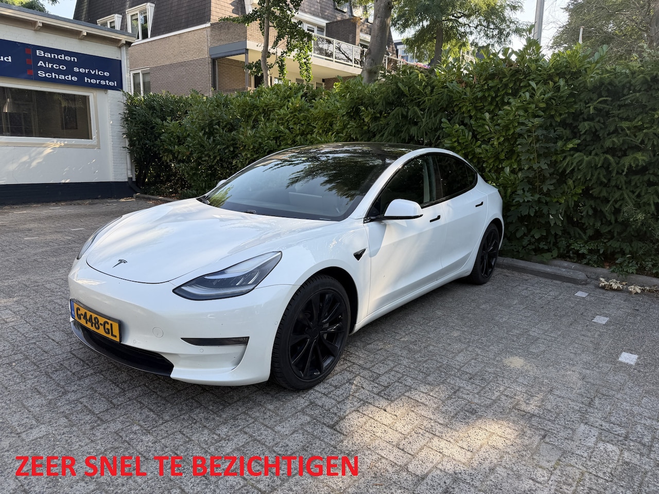 Tesla Model 3 - Long Range RWD Long Range AWD 75 kWh Panoramak dak/ stoelverwarrming - AutoWereld.nl