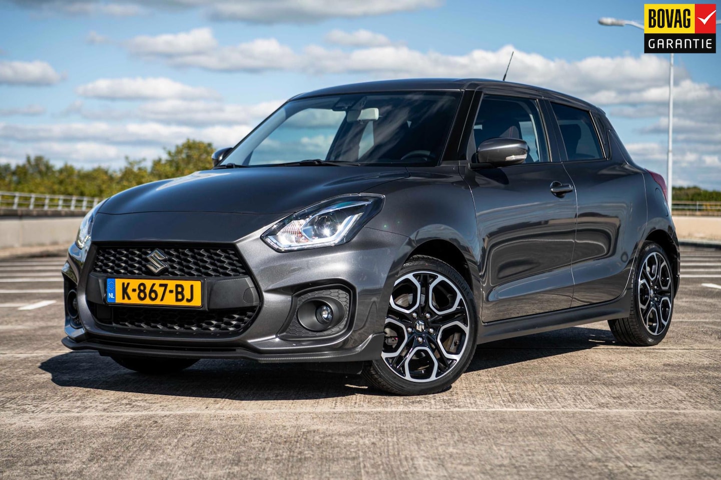 Suzuki Swift - 1.4 Sport Smart Hybrid | Airco/Clima | Achteruitrijcamera | Stoelverwarming | - AutoWereld.nl
