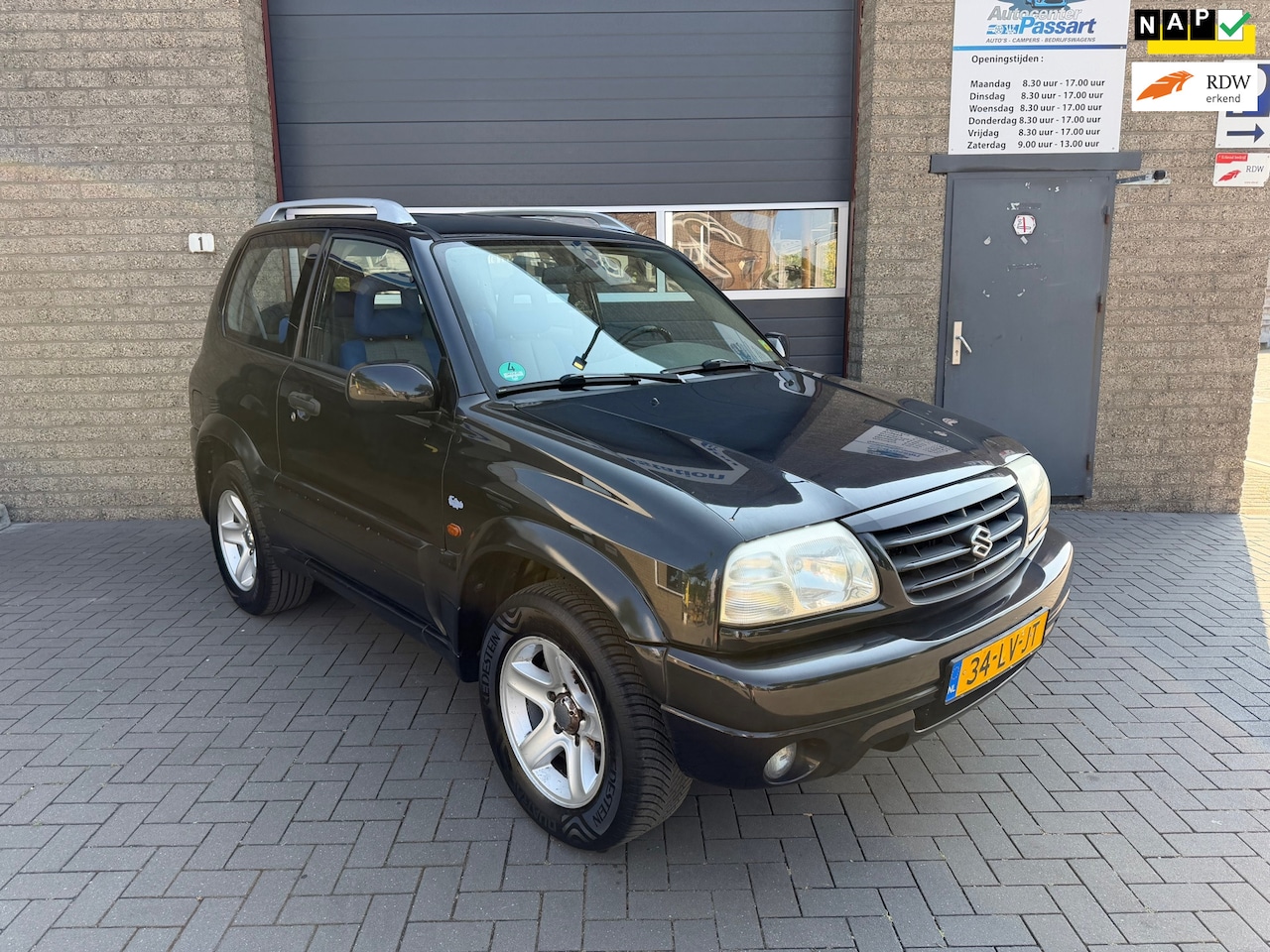 Suzuki Grand Vitara - 2.0 Metal Top Wide Body 2.0 Metal Top Wide Body - AutoWereld.nl