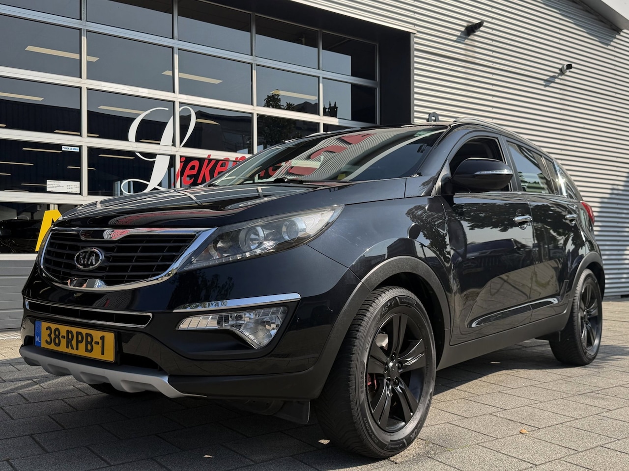 Kia Sportage - 1.6 GDI X-ecutive Plus Pack - Panorama dak I Navigatie I Leer I Airco I Sport velgen I - AutoWereld.nl