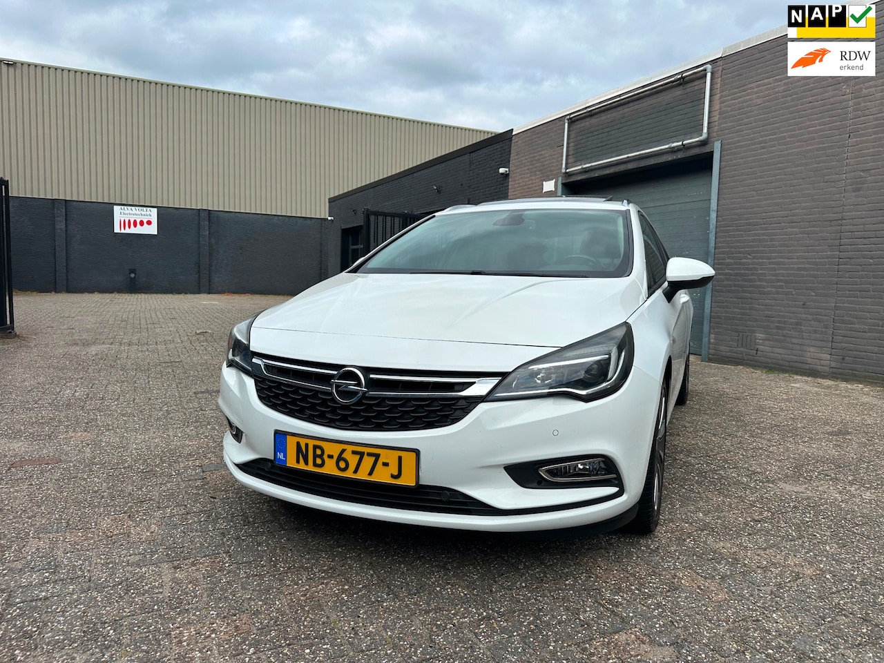 Opel Astra Sports Tourer - 1.4 Business+ Clima Cruise Navi Dak Led PDC LM-Wielen APK NAP. - AutoWereld.nl