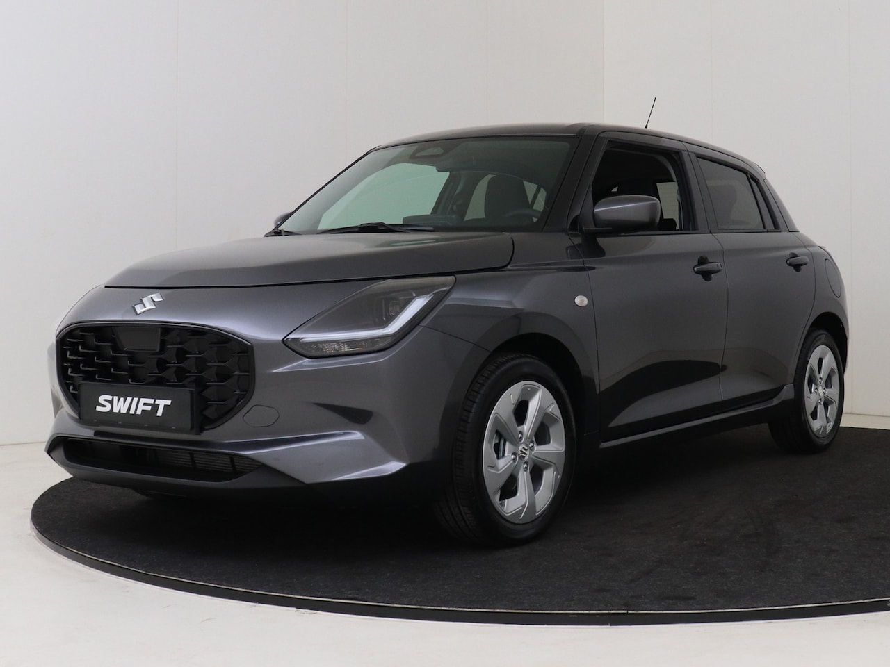 Suzuki Swift - 1.2 Select Smart Hybrid | 16" Velgen | Stoelverwarming | Lederen Stuurwiel | Apple Carplay - AutoWereld.nl